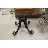 Wrought iron and glass table