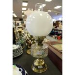 Oil lamp with white shade with painted glass reservoir