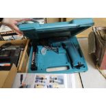 Makita drill and 2 other power tools and stand