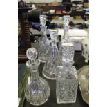 Victorian new stone china jug along with 5 crystal glass decanters