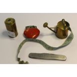 Brass 'watering can' tape measure, singer sewing machines penknife & two other items