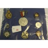 Collection of 8 WWI lapel badges and medals to the Border regiment Old Comrades, Cumberland National