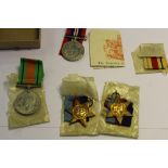 Group of four WWII medals to K. Cunliffe, 39-45 Star, 39-45 War Medal, Defence Medal and Africa
