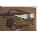 Bourne 12 bore shotgun, gun cleaning kit, belt - 25 cart case and 2 box cart. Please note: a valid