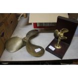 Brass propeller and smaller model