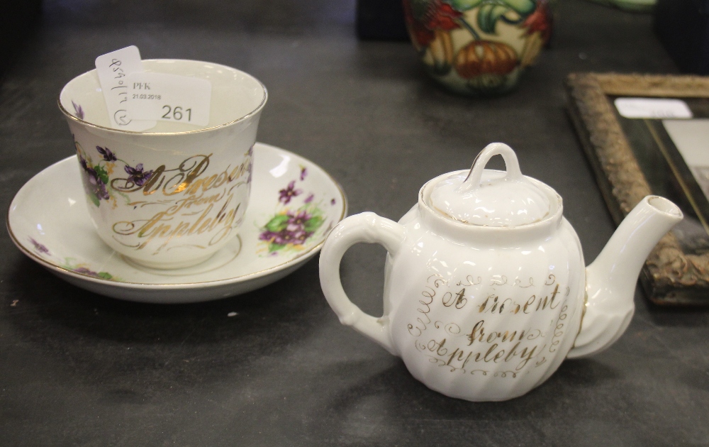 19th Century commemorative china items: teacup and saucer and miniature teapot with over, both