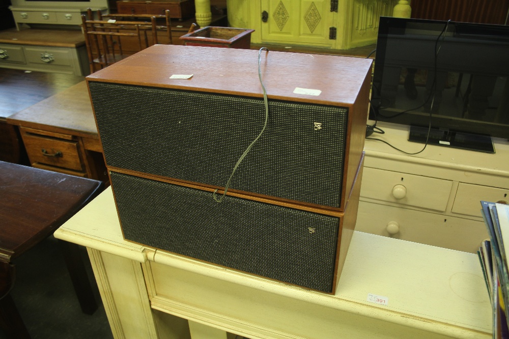 Two vintage Bang & Olufsen speakers and a small selection of vinyl records