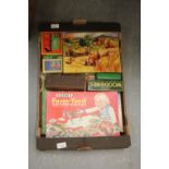 Box of jigsaws and dominoes