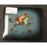 A Russian painted trinket box, the lid decorated with mounted Cossack(?) horseman riding through the