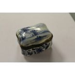 19th Century Dutch Delft pottery serpentine trinket box, with factory mark O/A to base (mount