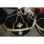 Late 19th/Early 20th Century black velvet and gilt brocade sporting cap, with tassel and embroidered