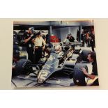 Original Nigel Mansel Formula One photograph in black and gold Lotus JPS Special