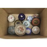 Thirteen 19th and 20th Century porcelain, papier mache and other snuff, trinket and patch boxes,