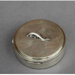 A Georg Jensen silver compact with relief dolphin motif to lid, internal mirror and removable