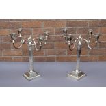 A pair of early 20th Century Mappin & Webb Princes plate four branch candlebra, with gadrooned