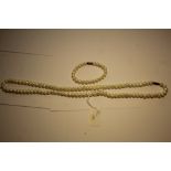 Cultured pearl necklace and bracelet