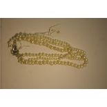 Triple strand cultured pearl necklace