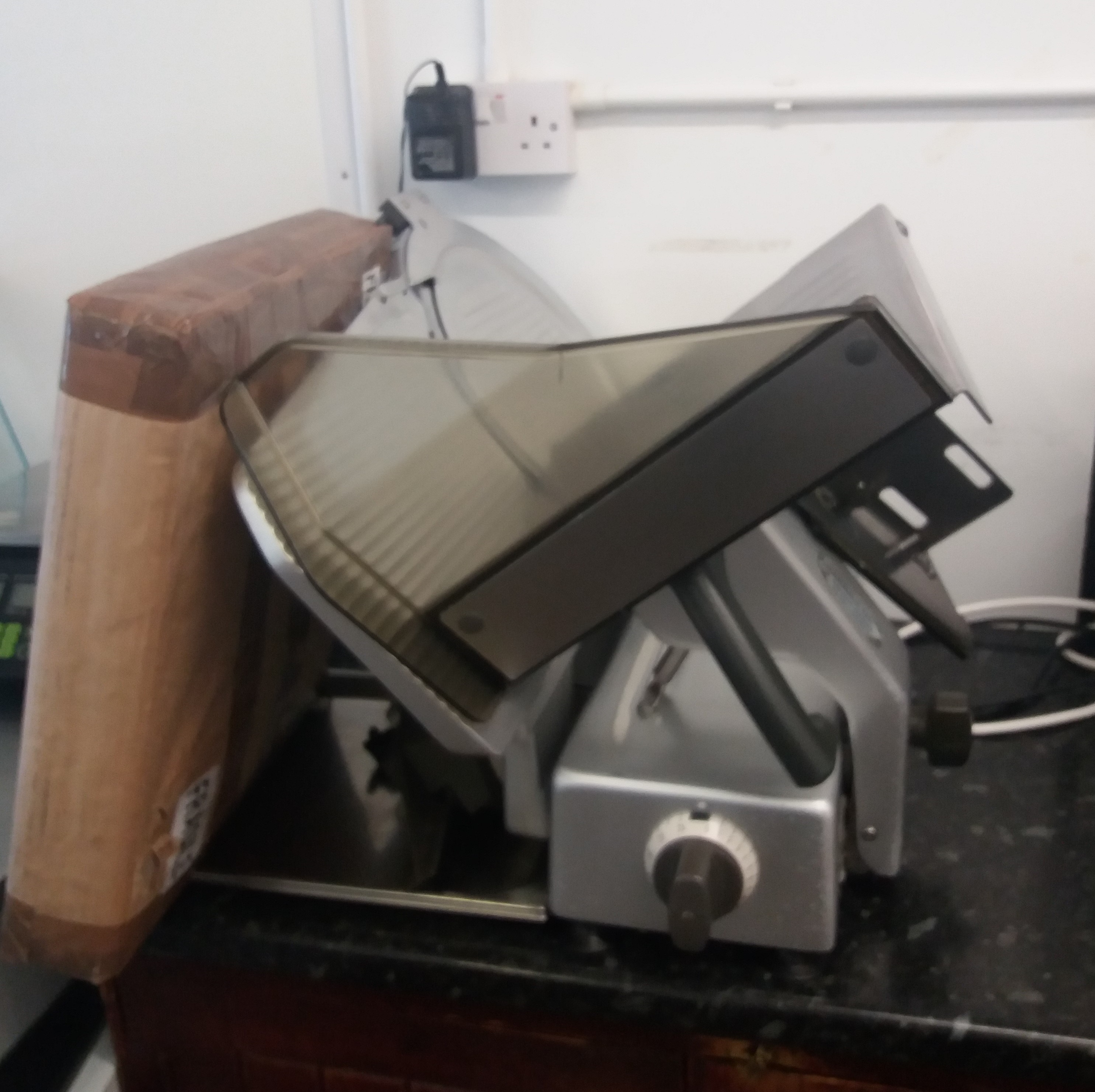 Meat slicer with spare blade