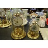 2 x 400 Day Clocks under Domes