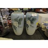 A pair of Royal Copenhagen porcelain baluster vases, decorated with brambles, 23cm high, printed