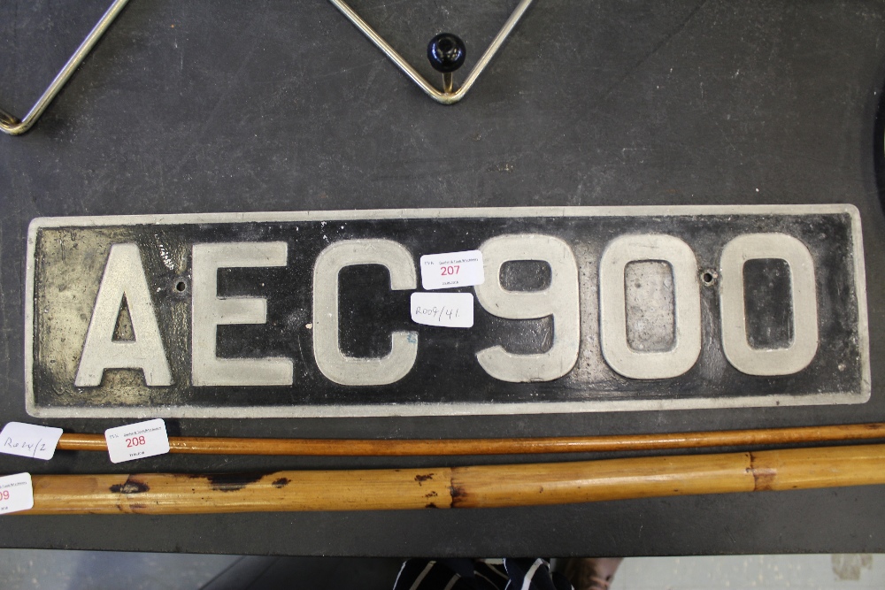 Metal number plate AEC 900