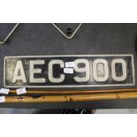 Metal number plate AEC 900