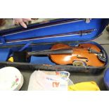 Violin and 2 bows, cased