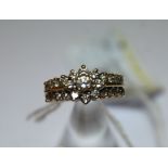 A 14k Gold all Diamond Set Dress Ring with central floral motif and set with 25 brilliant cut