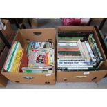 2 boxes of books on trains, buses, trams cars etc