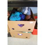 Box of mohair and box of coloured wool