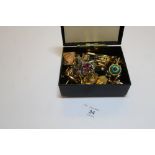 Assorted cufflinks and tie clips