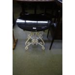 Small wrought iron glass top table