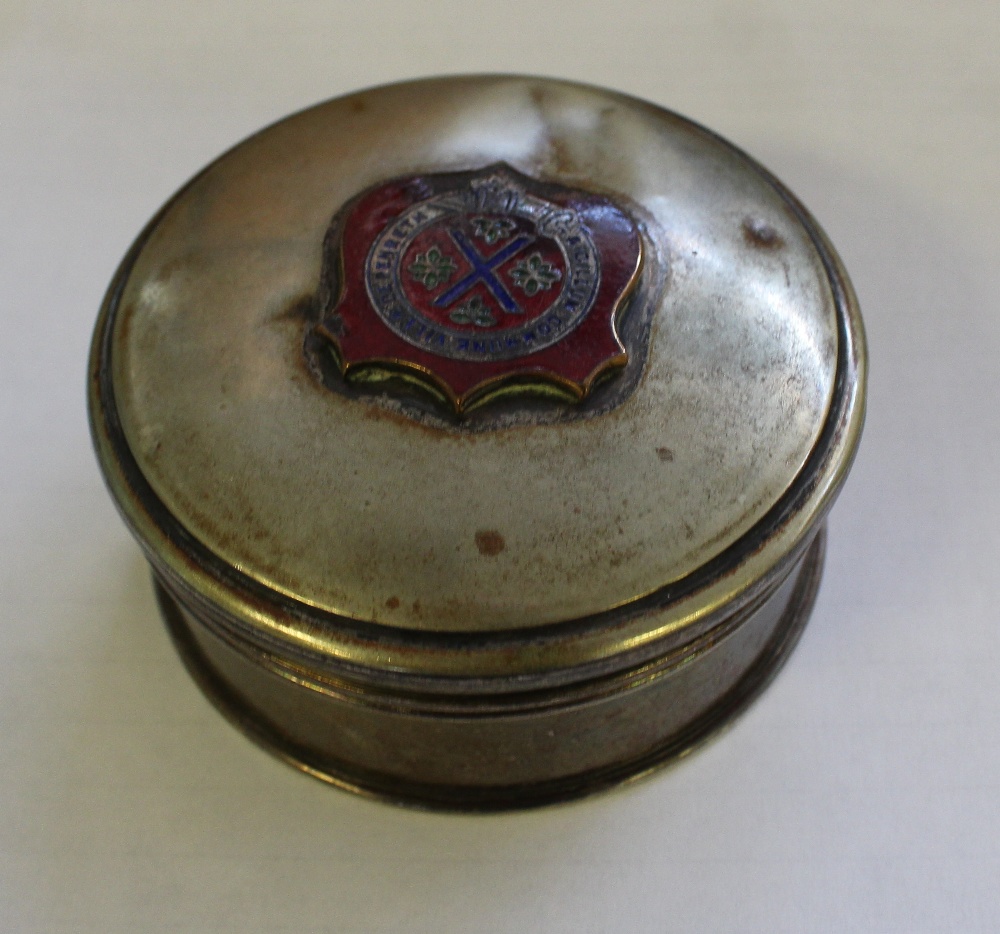 White metal circular lidded box with enamelled Penrith crest