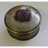 White metal circular lidded box with enamelled Penrith crest