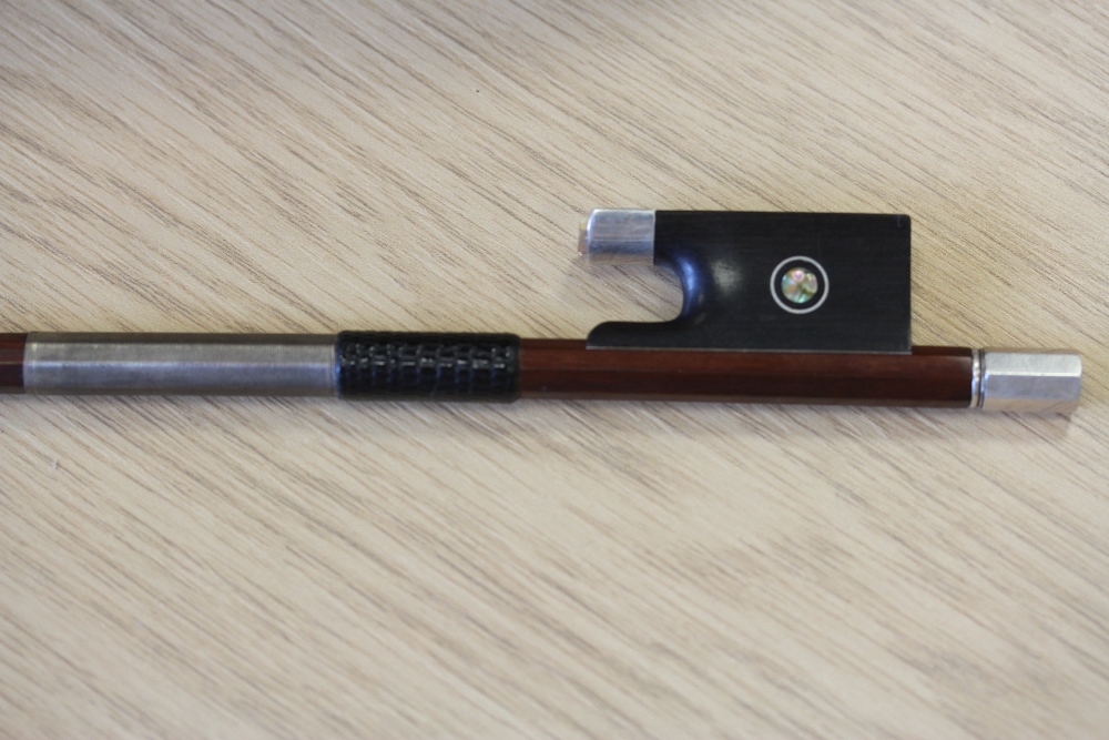 A silver mounted violin bow branded VF Fetique A Paris. Octagonal stick, full size, together with - Image 10 of 11