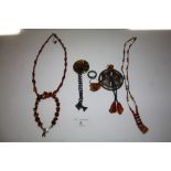 Bag of amber jewellery etc