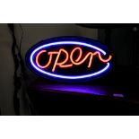 Neon type 'OPEN' sign