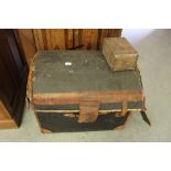 Domed leather trimmed canvas trunk