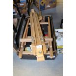 Box of art materials and 2 easels
