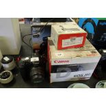 Canon EOS 20D digital SLR with Canon 18-55mm lens and BG-E2 battery grip, with boxes