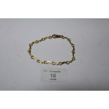 18ct gold Snaffle bracelet, 10 grams