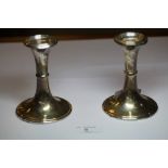 Pair of silver candlesticks (loaded)