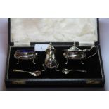 A Cased silver condiment set