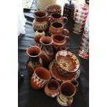 Quantity of red Torquay ware pottery