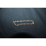 9ct gold bracelet with oval textured links, weight 3 grams