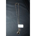 Gold coloured metal (thought gold) watch chain with T bar and swivel fob, weight 10 grams