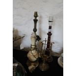 Three electric table lamps and a gilt metal candle holder
