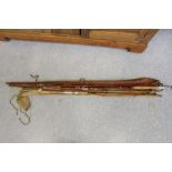 Two fly fishing rods - Milward two piece cane and Milbro three piece fibre glass, both with canvas