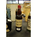 Small bottle of Idle, Chapman & Co 'Idol Brand' Sloe Gin, with war period label, capsule in good