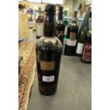 Old bottle (approx 75cl) of WA Gilbey Castle E Port, the handwritten label dated 1899, good seal,